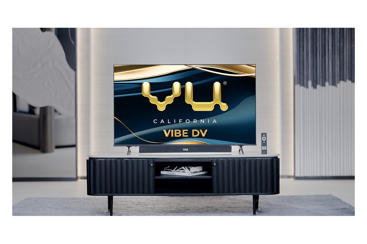 Vu Vibe DV 55-inch QLED TV with its integrated soundbar on a TV unit